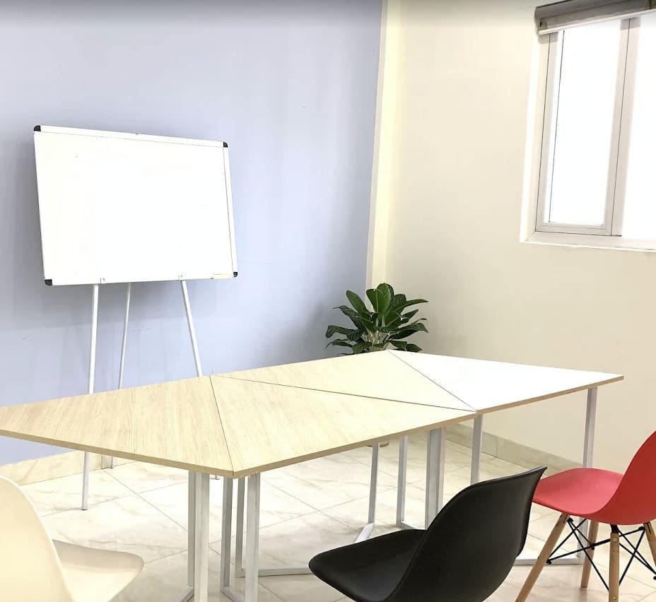 A classroom at Go Vietnamese, with a board and a table for small groups