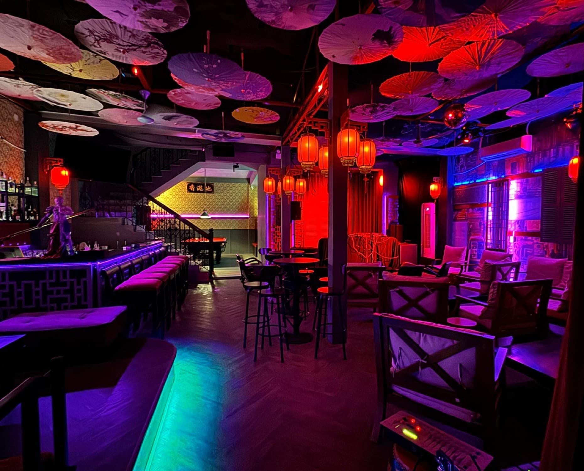 Kong 72 Speakeasy Bar, the main room with paper parasols covering the ceiling and red lanterns between them