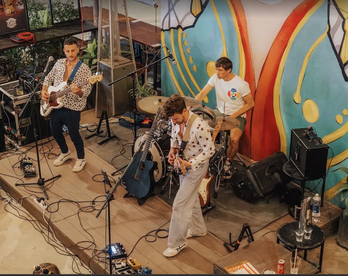 A band playing live on the stage at Section 30 in Da Nang
